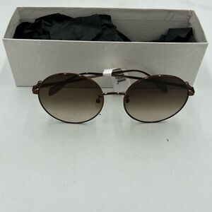 Women’s Alexander McQueen round sunglasses made in Italy